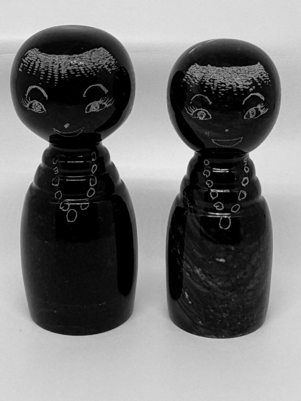 Vintage Japanese Black Stone Kokeshi Dolls – Set of 2 – Hand-Carved Folk Art